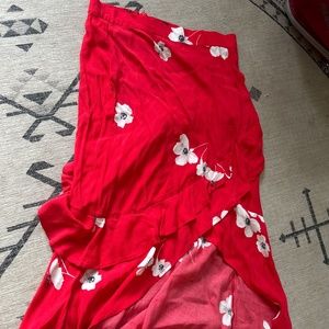 Red asymmetrical midi skirt